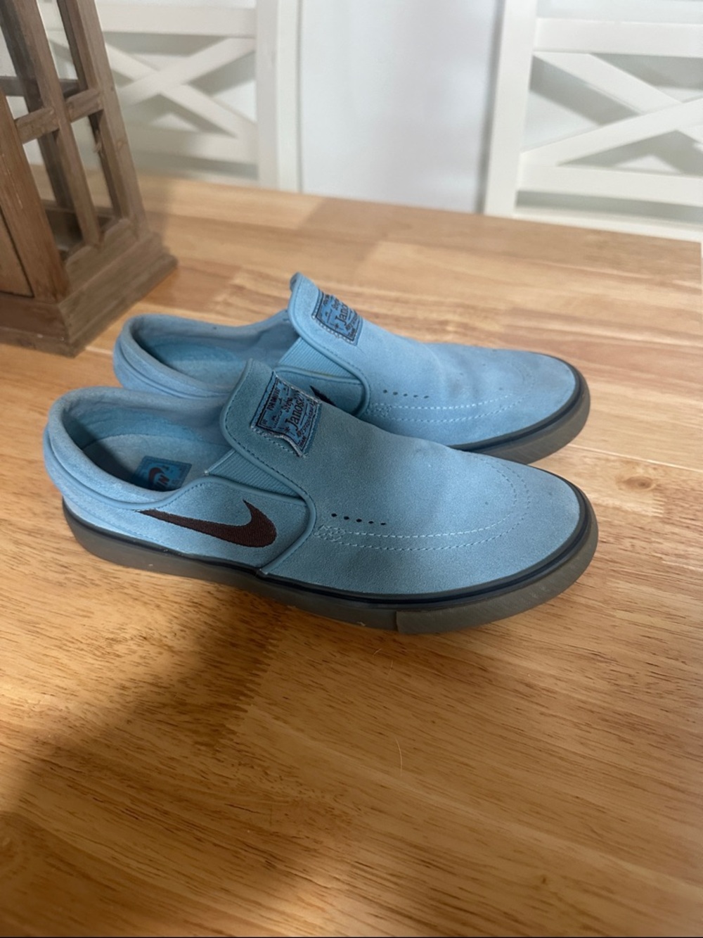 Nike women’s Slip-On Suede Loafers in Light Blue with Dark Swoosh